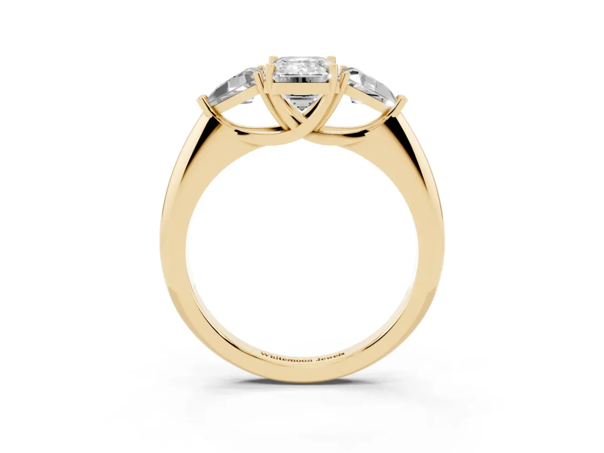 Three-Stone Emerald Cut Diamond Engagement Ring with Trillion Side Stones and Prong Setting Yellow gold