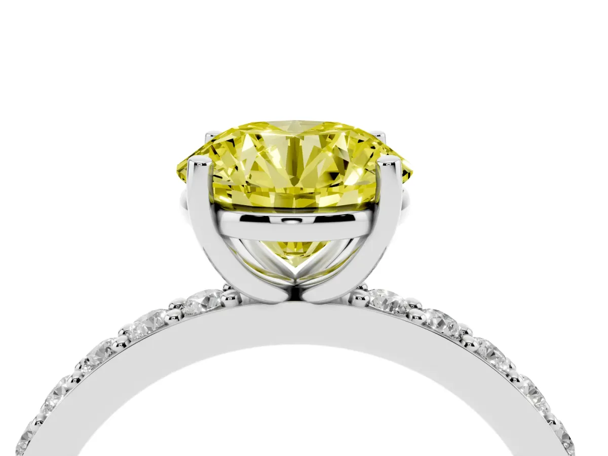 Fancy Yellow Round Cut Cut Diamond Solitaire with Pave Band and Four-Prong Setting Silver
