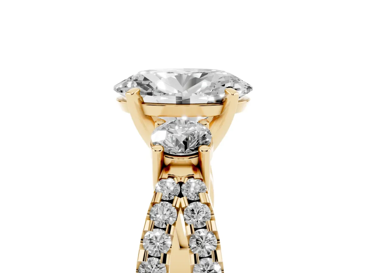 Oval Cut Diamond Three-Stone Ring with Pavé Split Shank and Four-Prong Setting Yellow gold