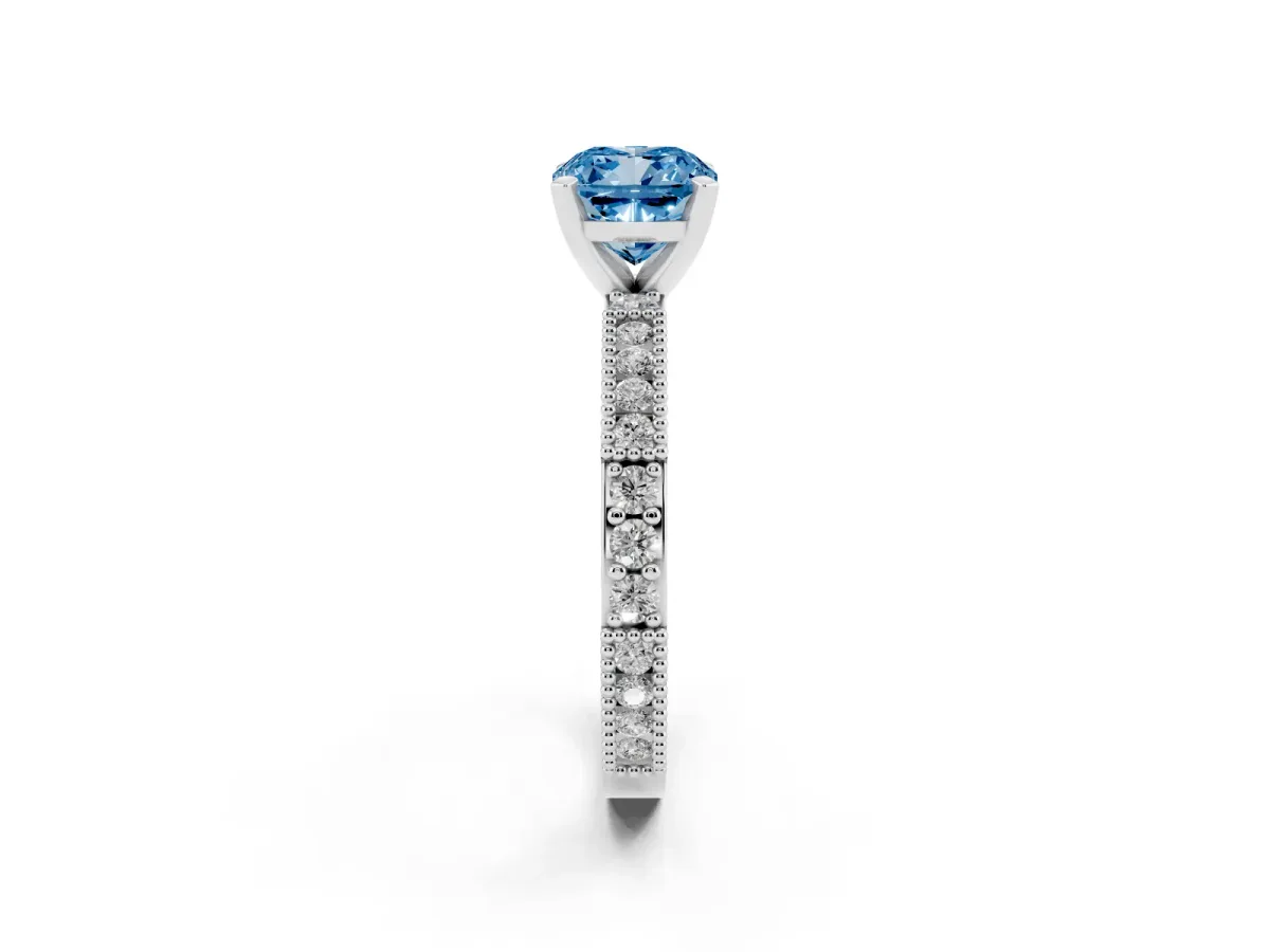 Fancy Blue Cushion Cut Solitaire with Pavé Band and Four-Prong Setting Silver