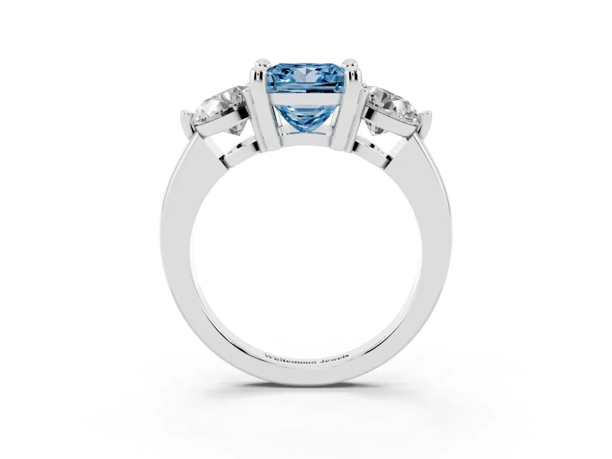 Fancy Blue Three-Stone Princess Cut Brilliant Cut Solitaire Ring with Prong Setting on a Classic Band Silver