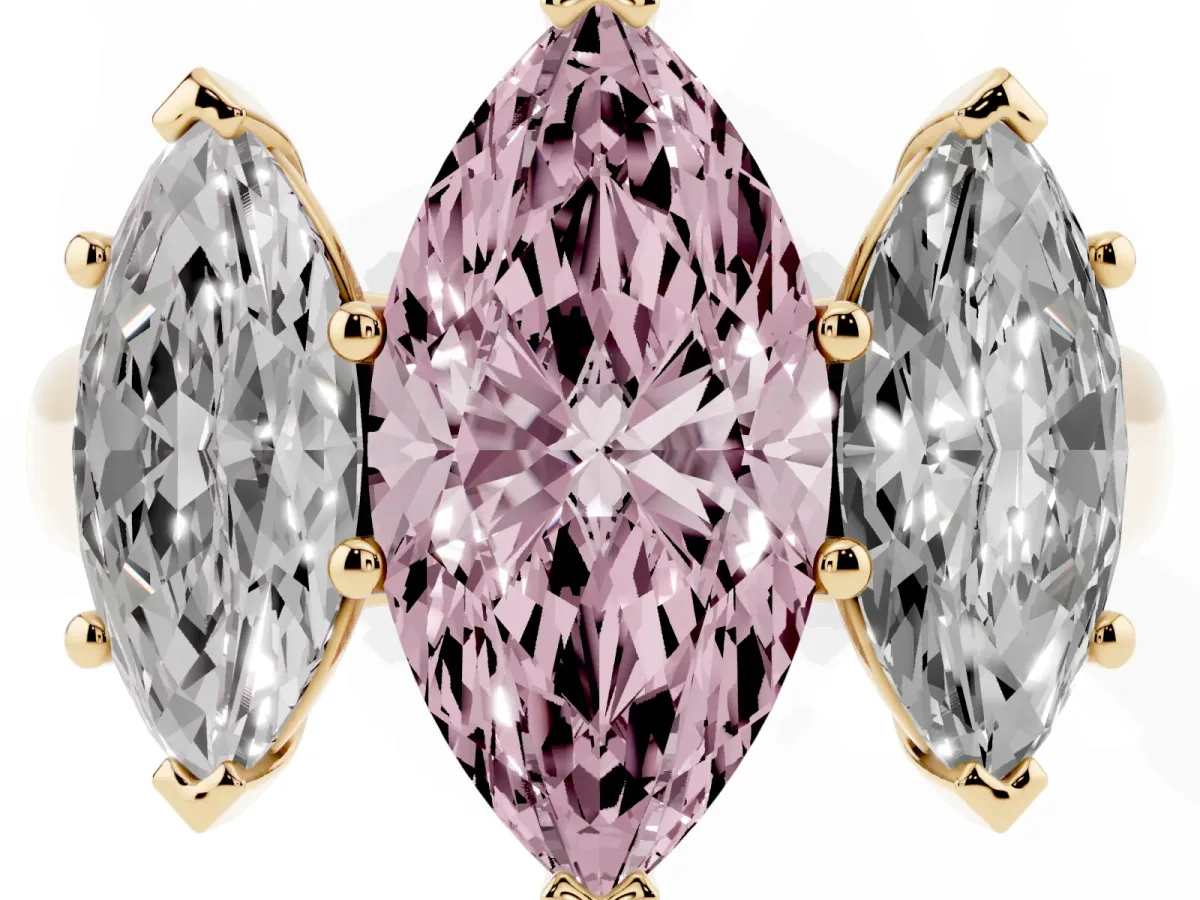 Fancy Pink Marquise Cut Three-Stone Diamond Ring with Prong Setting on a Classic Band Yellow gold