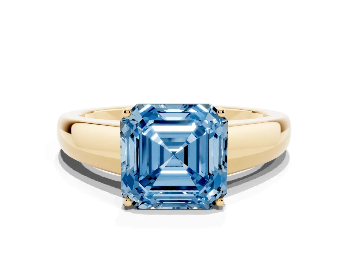 Fancy Blue Asscher Cut Solitaire Diamond Ring with Tapered Band and Four-Prong Setting Yellow gold