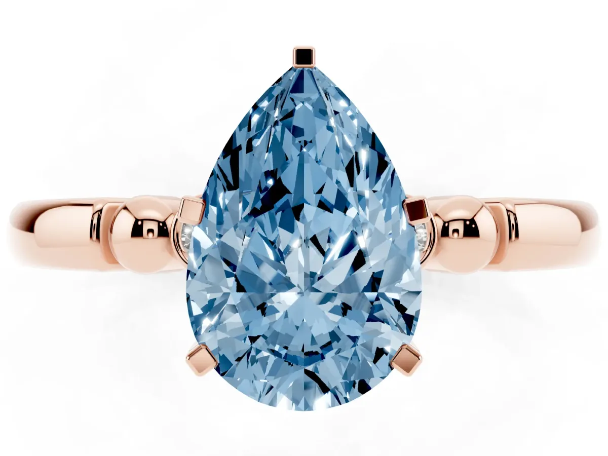 Fancy Blue Pear Cut Solitaire Beaded Band with Four-Prong Setting Rose gold