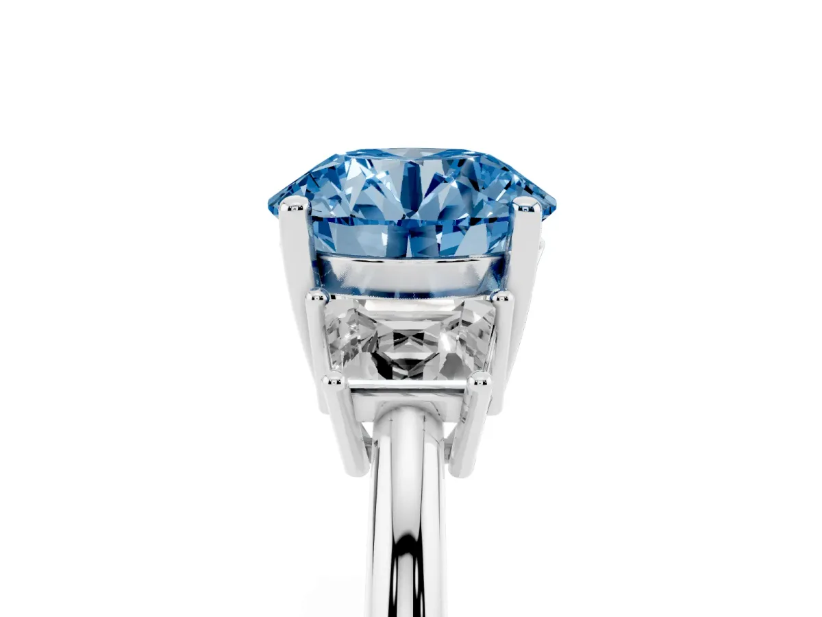Fancy Blue Round Cut Diamond Three-Stone Ring with Trapezoid Side Stones and Prong Setting Platinum