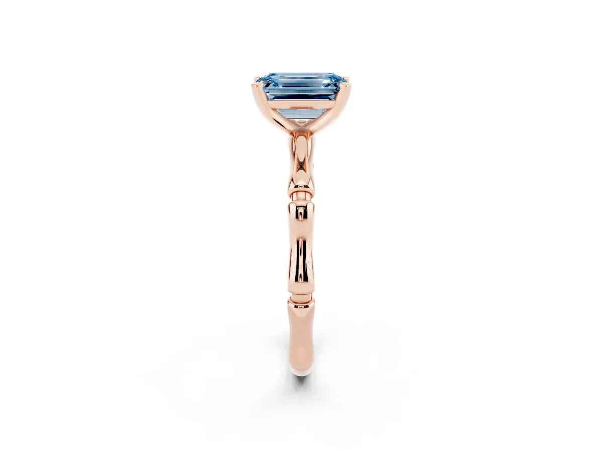Fancy Blue Emerald Cut Solitaire Diamond Ring with Bamboo Band and Four-Prong Setting Rose gold