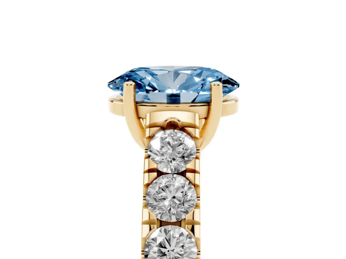 Fancy Blue Oval Cut Cut Diamond Solitaire Ring with Micro Pave Band and Prong Setting Yellow gold