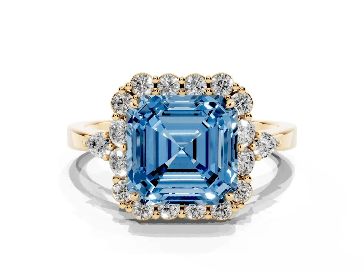 Fancy Blue Asscher Cut Diamond Halo Ring with Pear Side Stones and Prong Setting Yellow gold