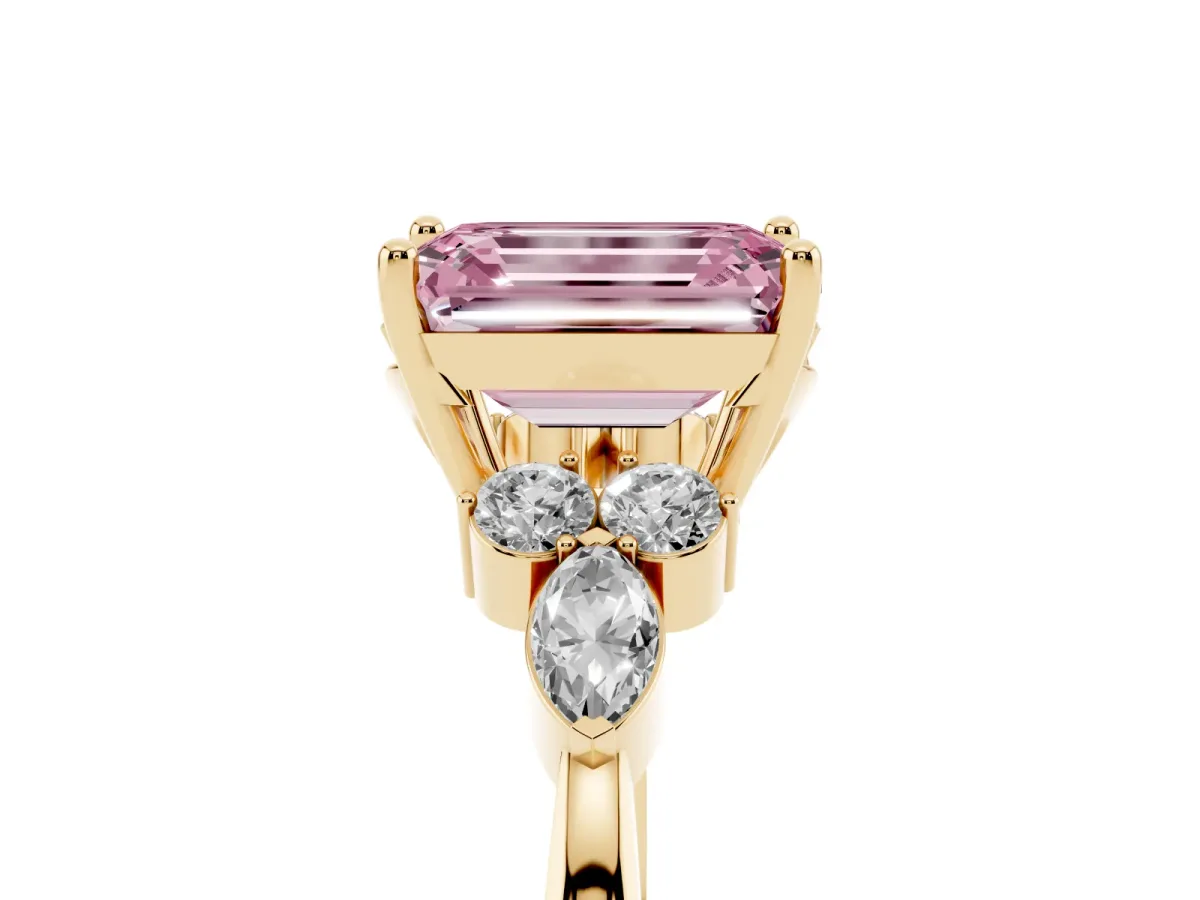 Fancy Pink Emerald Cut Brilliant Diamond Solitaire Ring with Pear Side Stones and Four-Prong Setting Yellow gold