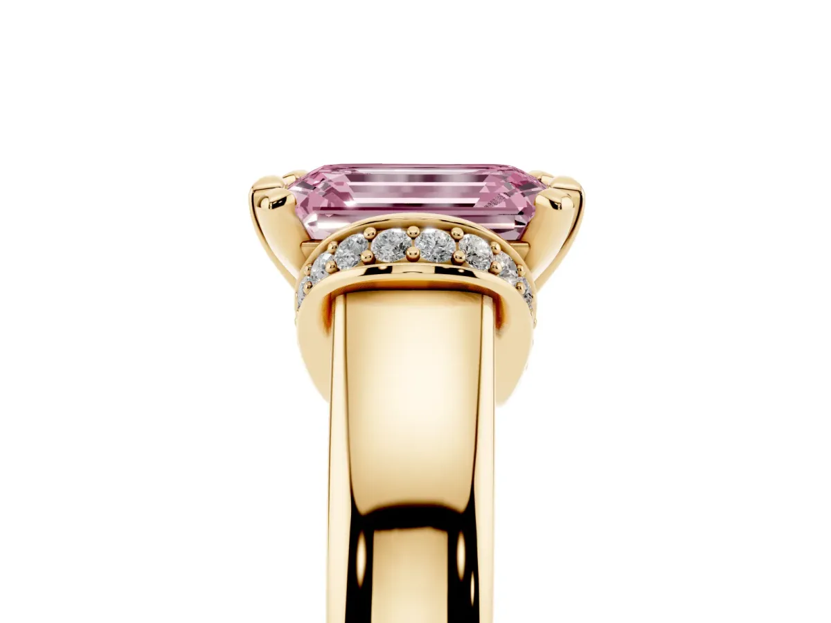 Fancy Pink Emerald Cut Solitaire Diamond Ring with Pave Band and Six-Prong Setting Yellow gold