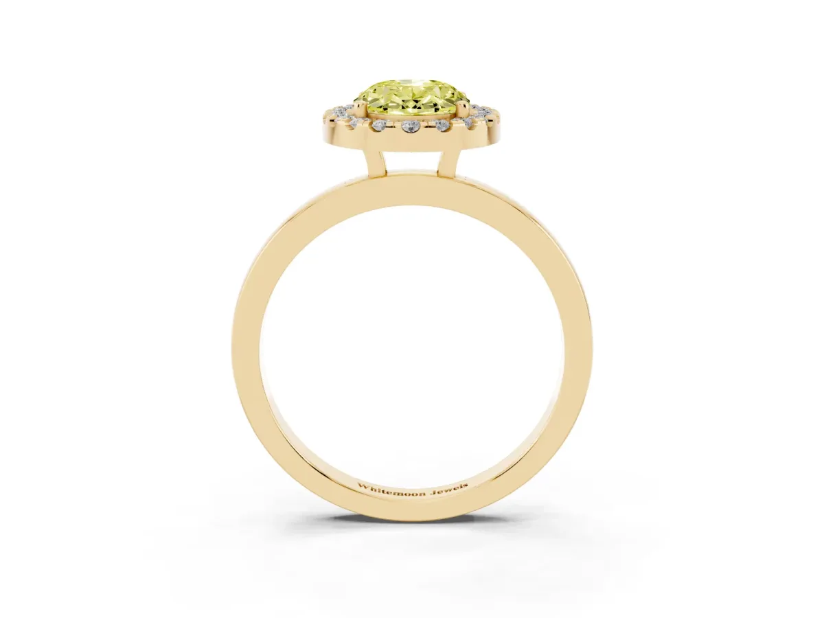Fancy Yellow Oval Cut Halo Diamond Solitaire with Pavé Band and Four-Prong Setting Yellow gold