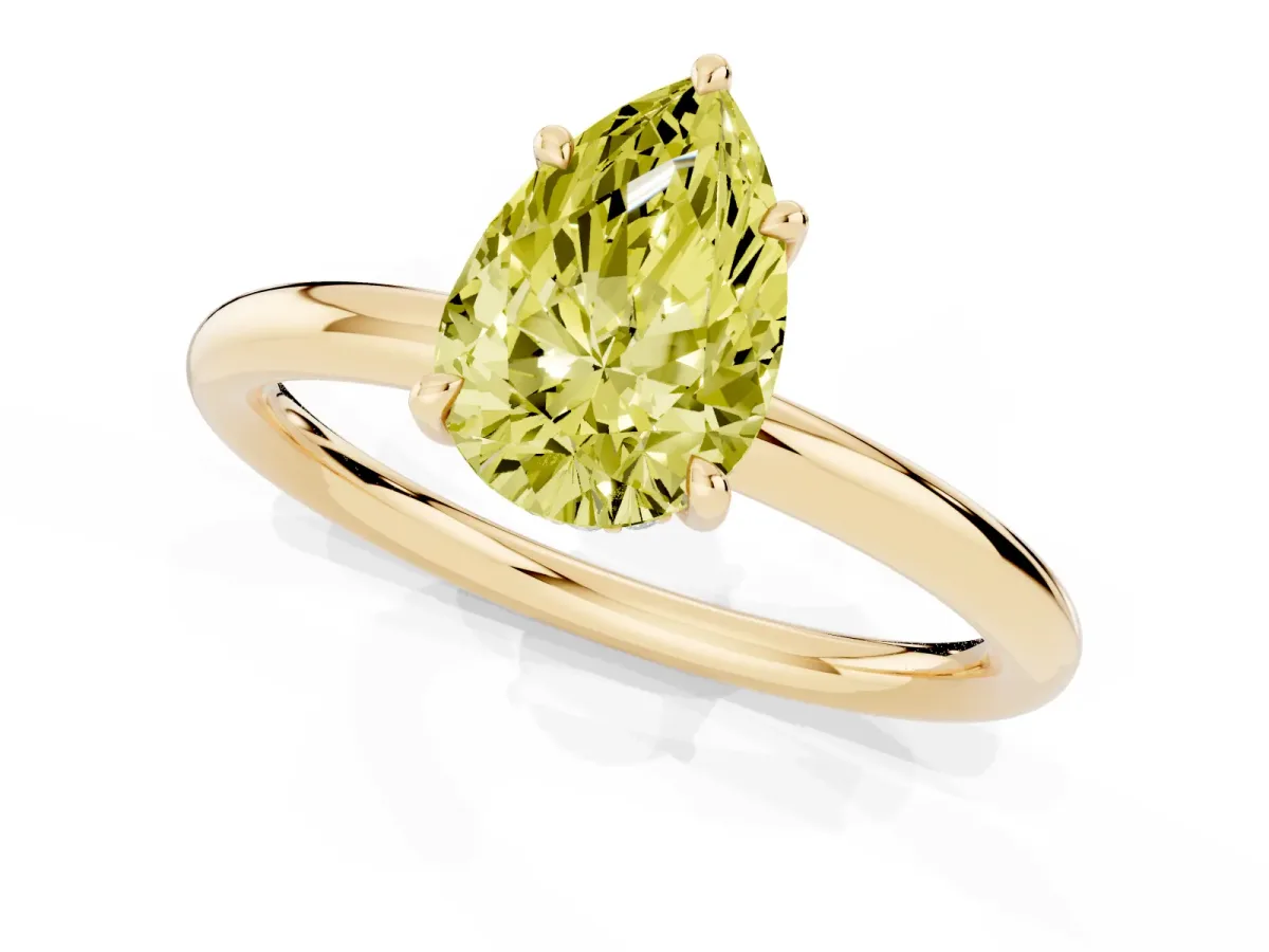 Fancy Yellow Pear Cut Diamond Solitaire Ring with Thin Band and Four-Prong Setting Yellow gold