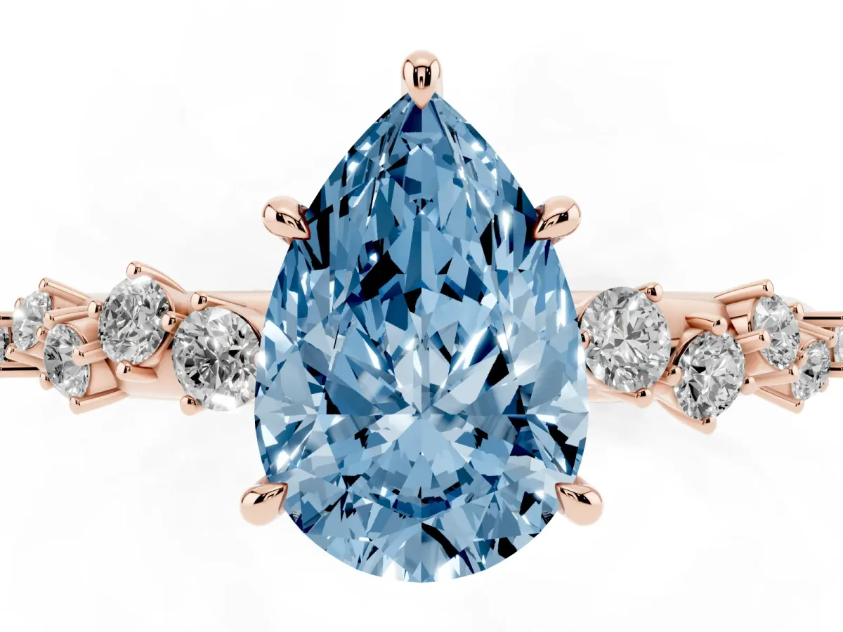 Fancy Blue Pear Cut Diamond Cluster Side Stone Solitaire Ring with Prong Setting Rose gold