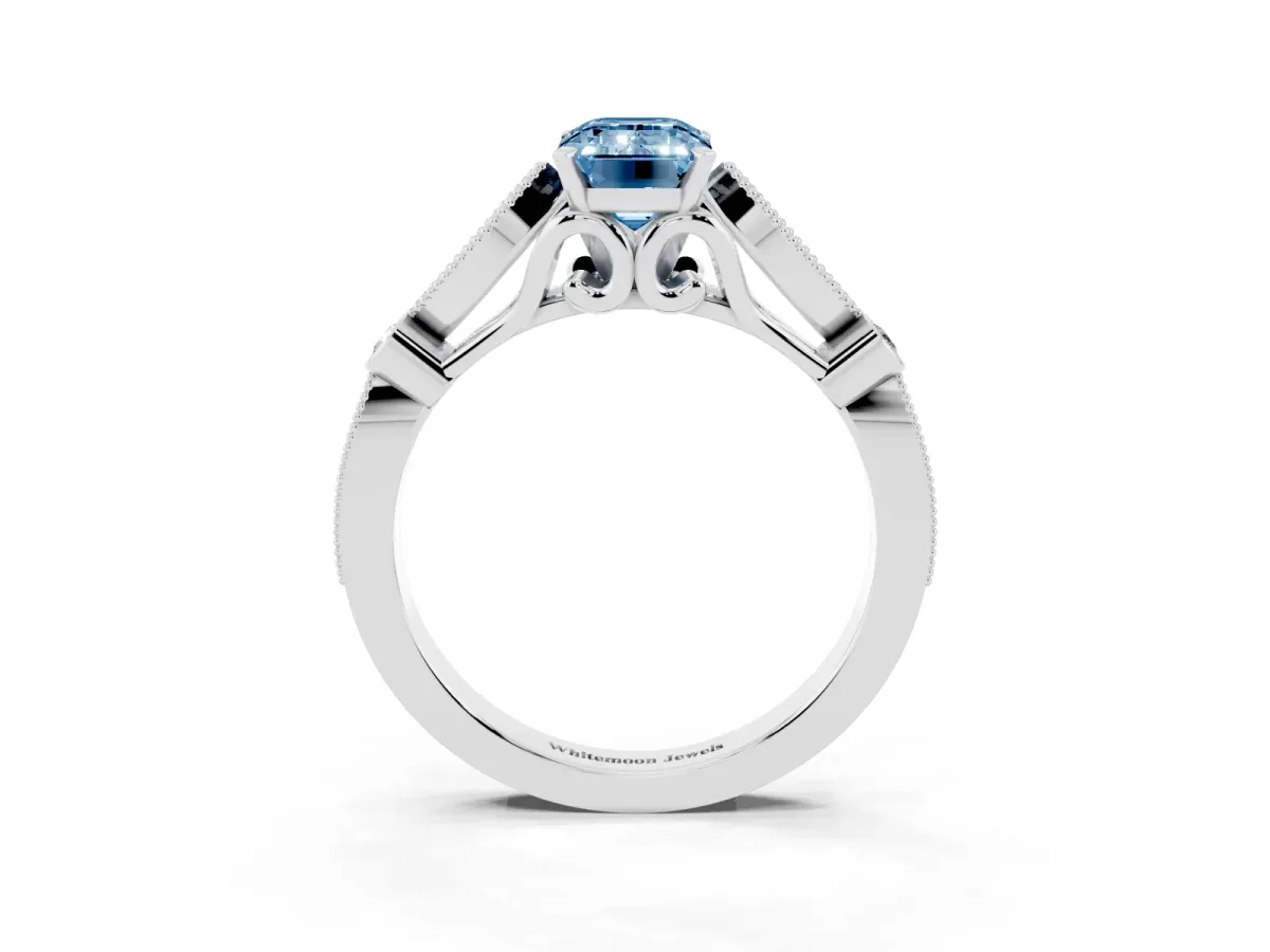Fancy Blue Emerald Cut Cut Diamond with Milgrain Marquise and Bezel Accents on a Solitaire Band with Prong Setting Silver