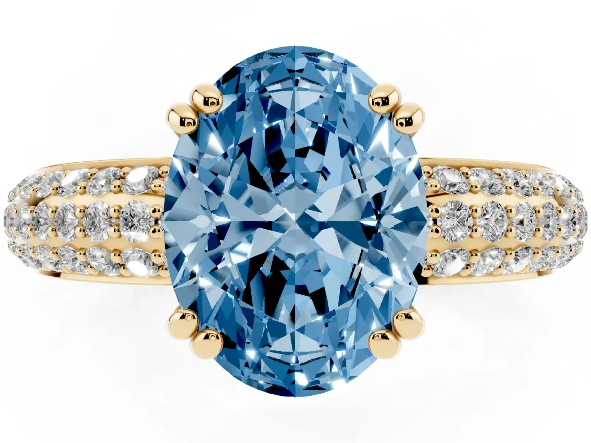 Fancy Blue Oval Cut Diamond Solitaire Ring with Multi-Row Round Pavé Band and Prong Setting Yellow gold