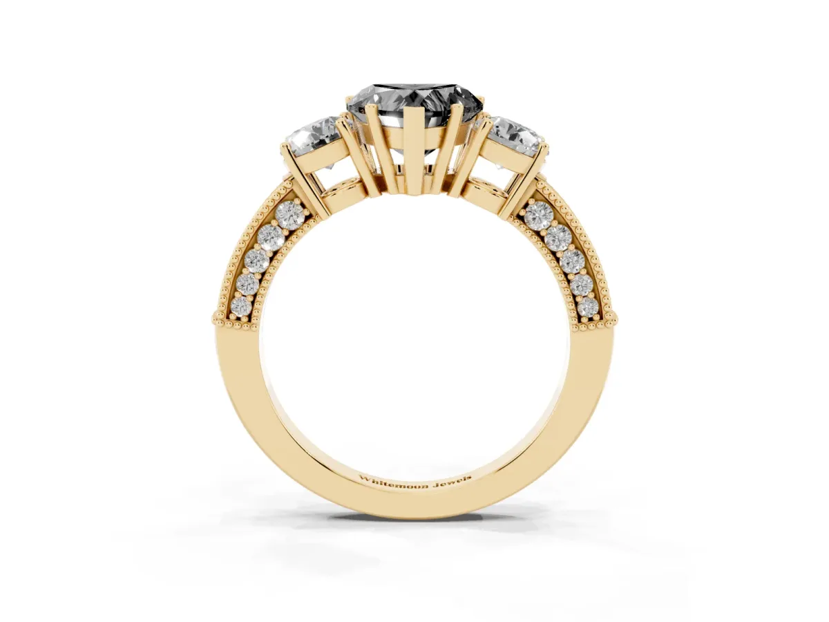 Fancy Black Heart Cut Three-Stone Diamond Ring with Pavé Band and Four-Prong Setting Yellow gold