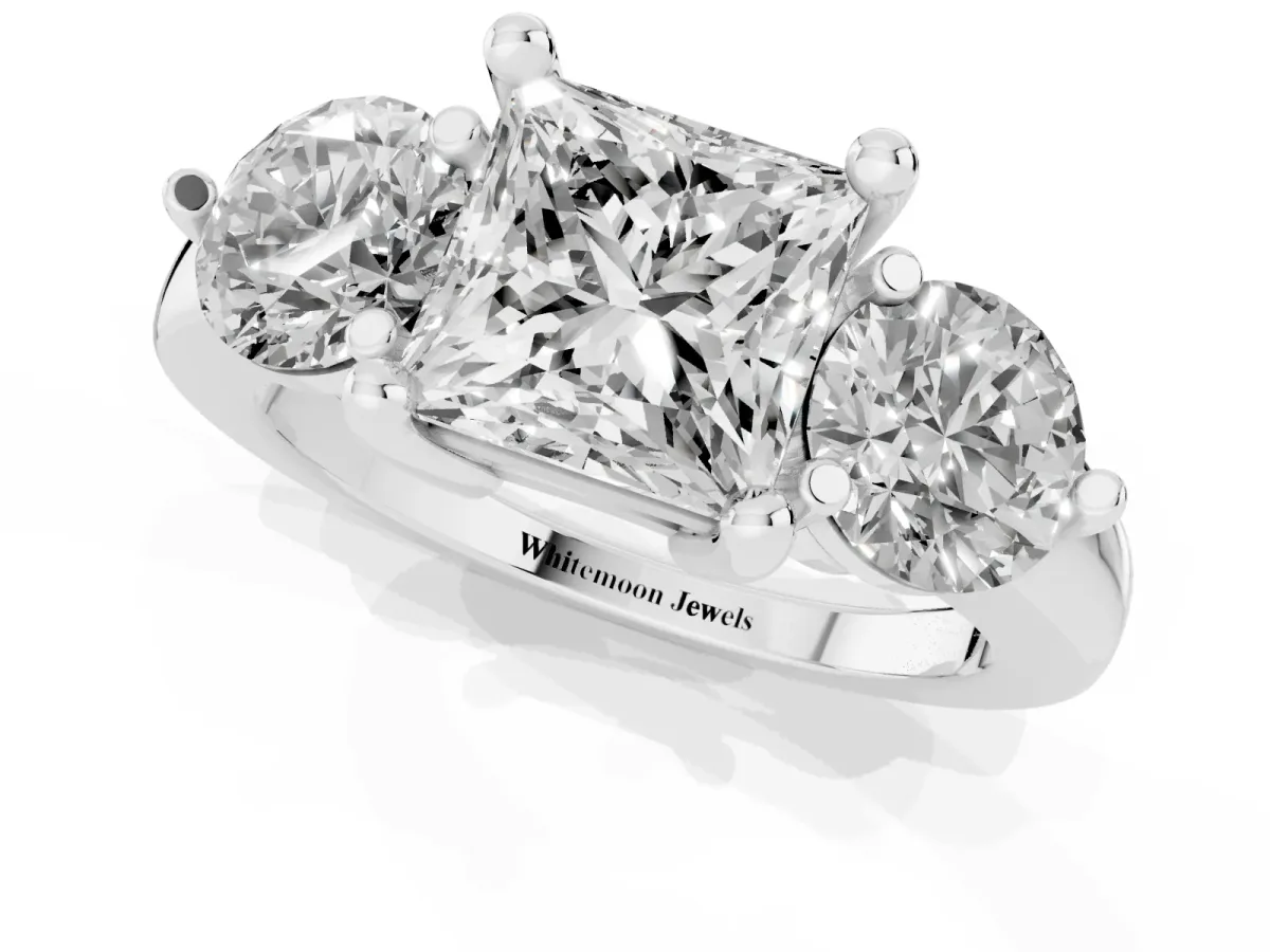 Three-Stone Princess Cut Brilliant Cut Solitaire Ring with Prong Setting on a Classic Band Platinum