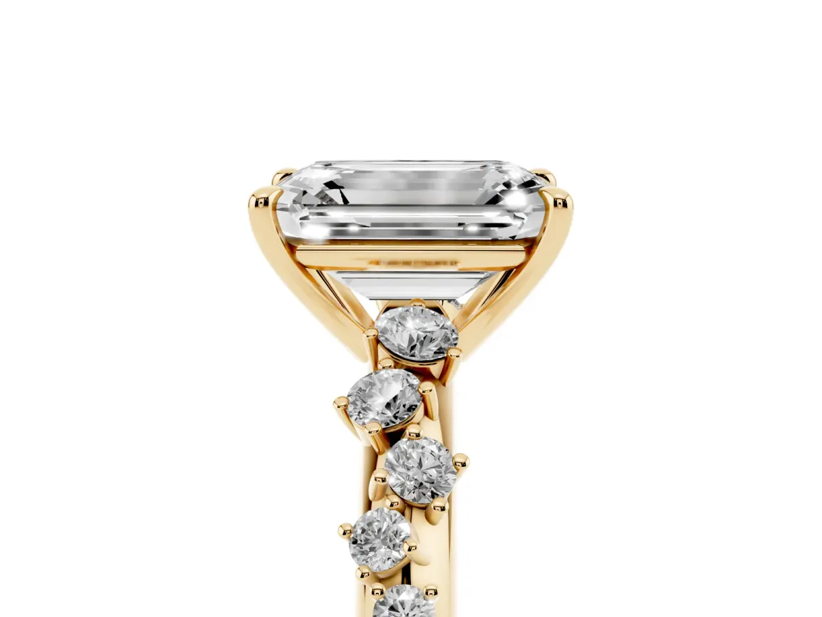 Emerald Cut Diamond Cluster Side Stone Solitaire Ring with Prong Setting Yellow gold