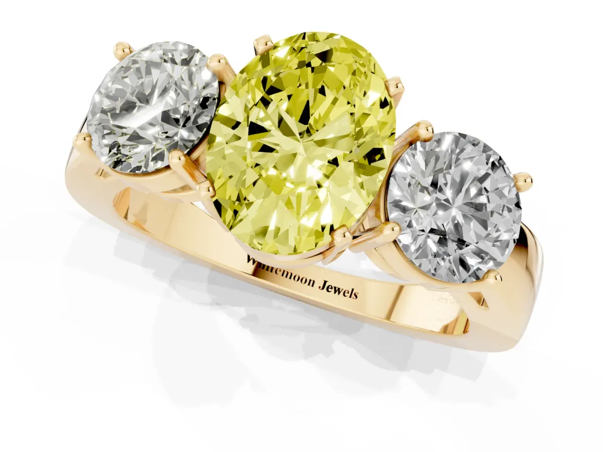 Fancy Yellow Three-Stone Oval Cut Diamond Ring with Round Side Stones, Classic Band, and Four-Prong Setting Yellow gold