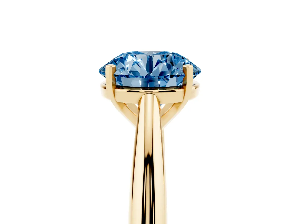 Fancy Blue Round Cut Diamond Solitaire Engagement Ring with Cathedral Setting and Four-Prong Mount Yellow gold