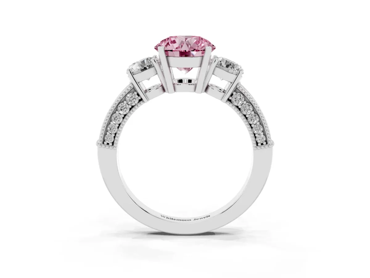 Fancy Pink Round Cut Three-Stone Diamond Ring with Pavé Band and Four-Prong Setting Silver