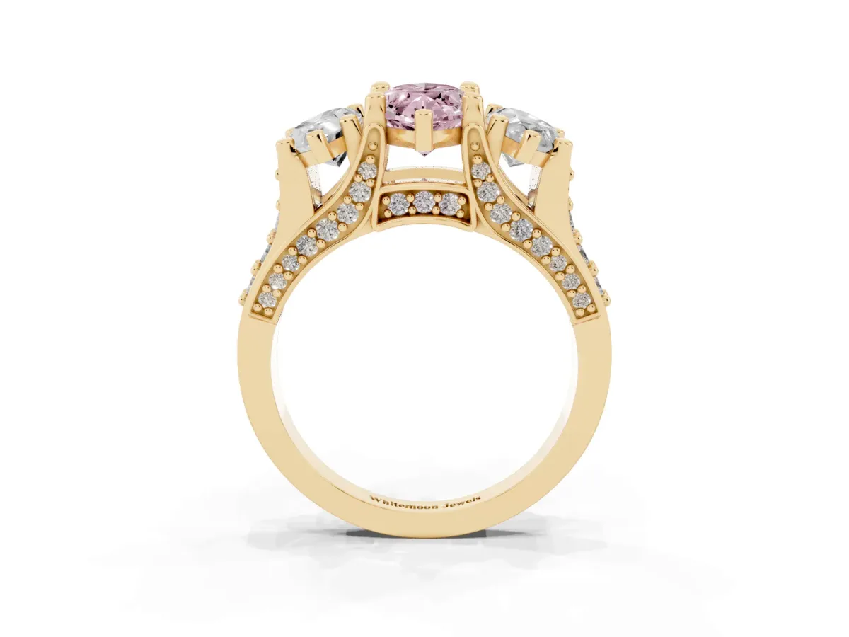 Fancy Pink Marquise Cut Diamond Three-Stone Ring with Channel Set Band and Four-Prong Setting Yellow gold
