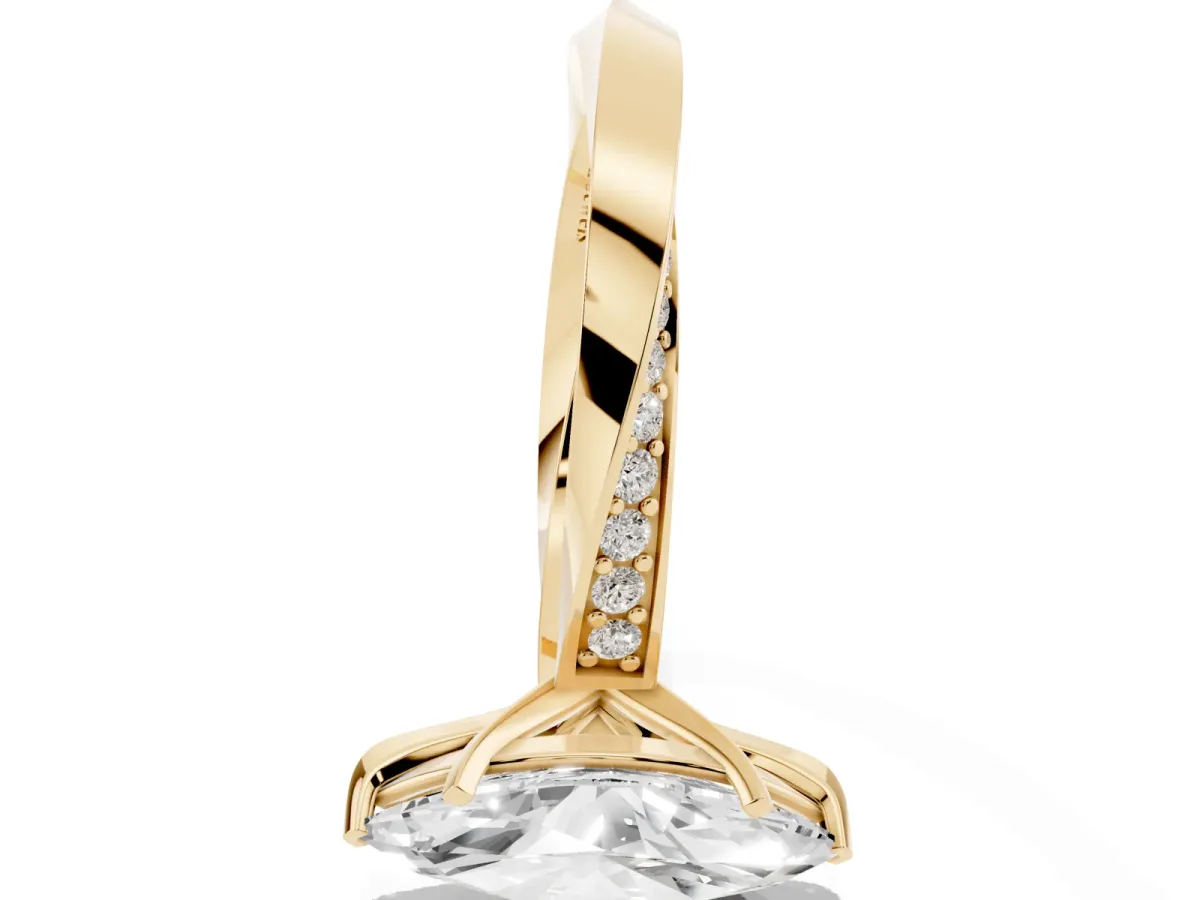 Marquise Cut Diamond Engagement Ring with Side Stone Accents and Four-Prong Setting Yellow gold