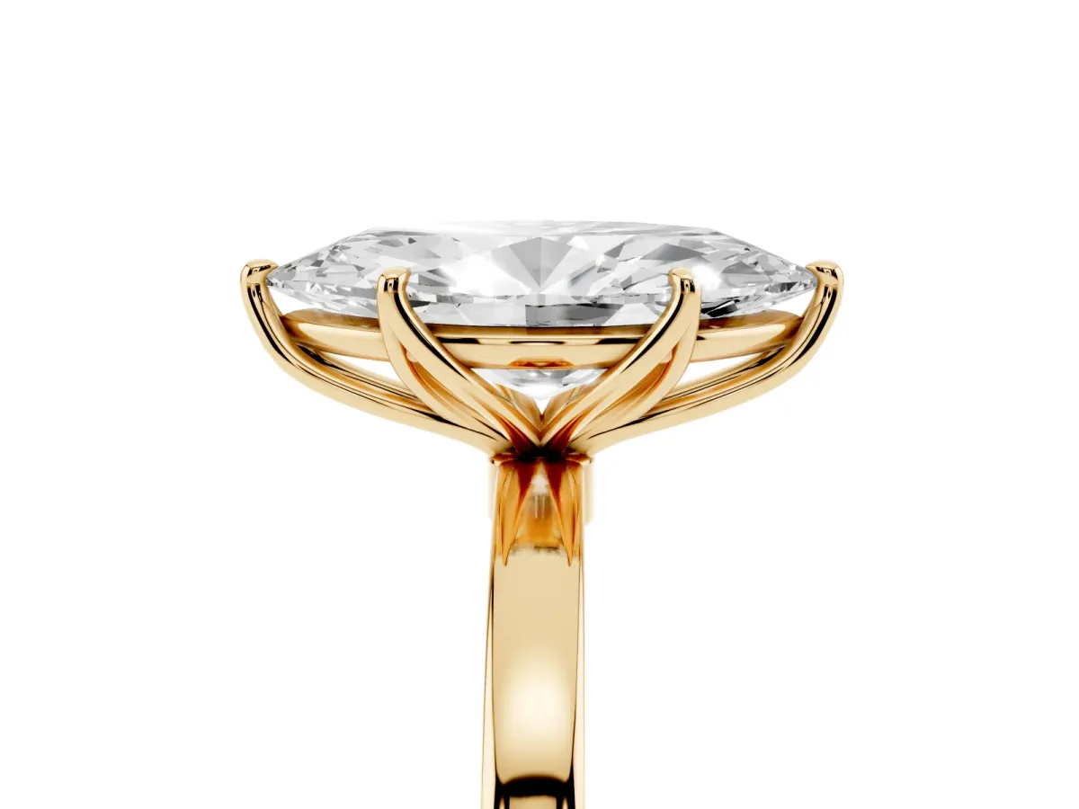 Marquise Cut Diamond Solitaire Ring with Thin Band and Prong Setting Yellow gold