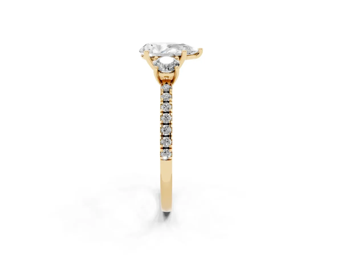 Three-Stone Pear Cut Cut Diamond Pavé Band with Prong Setting Yellow gold