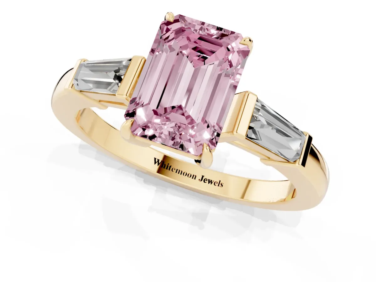 Fancy Pink Emerald Cut Diamond Three-Stone Ring with Tapered Baguette Side Stones and Prong Setting Yellow gold