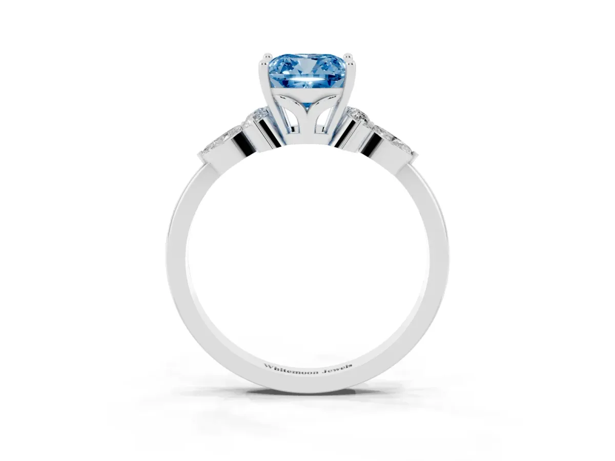 Fancy Blue Cushion Cut Brilliant Diamond Solitaire Ring with Pear Side Stones and Four-Prong Setting White gold