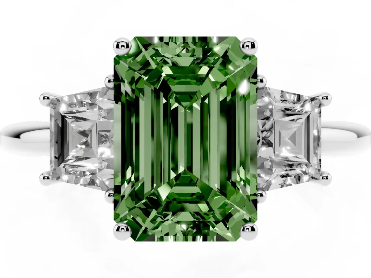 Fancy Green Emerald Cut Diamond Three-Stone Ring with Trapezoid Side Stones and Prong Setting Silver