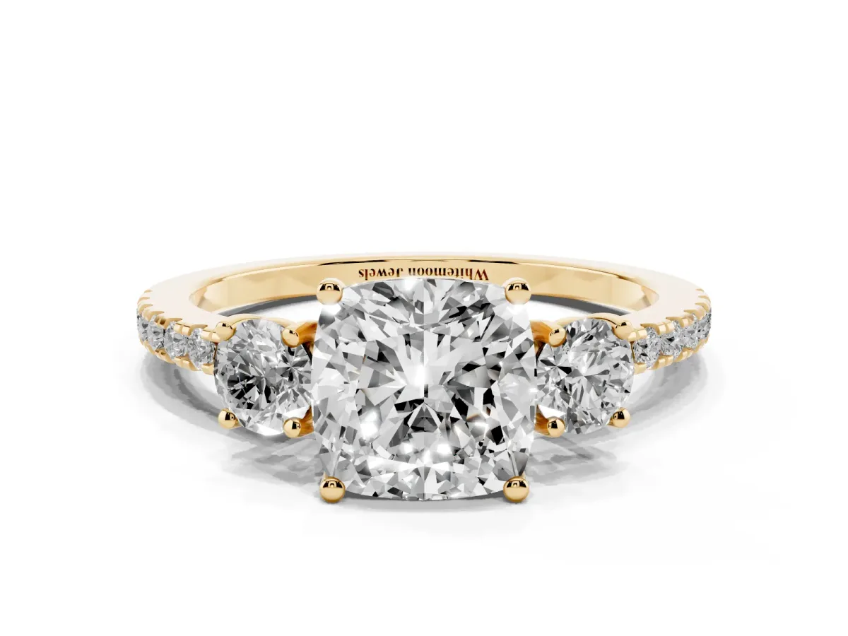 Three-Stone Cushion Cut Cut Diamond Pavé Band with Prong Setting Yellow gold