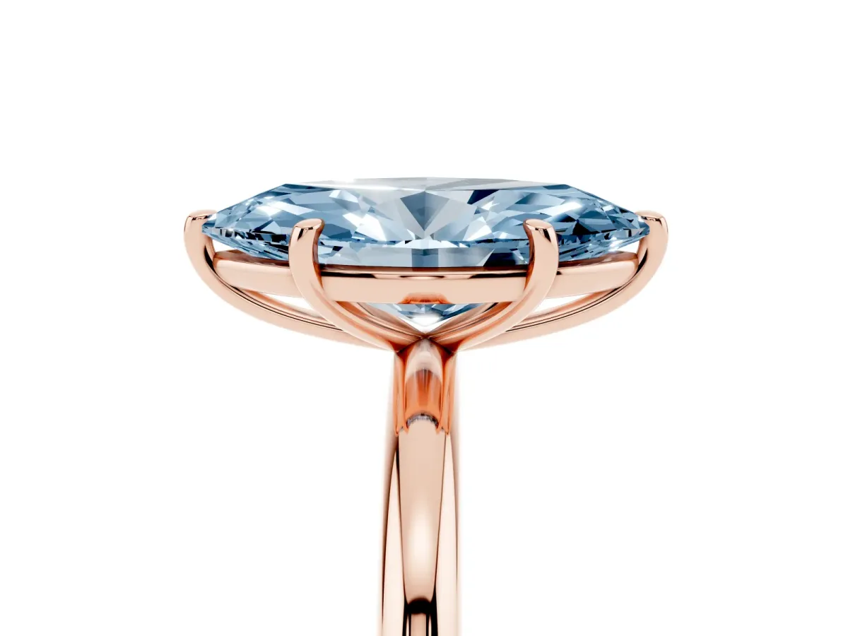 Fancy Blue Marquise Cut Solitaire Diamond Ring with Four-Prong Setting on a Plain Band Rose gold