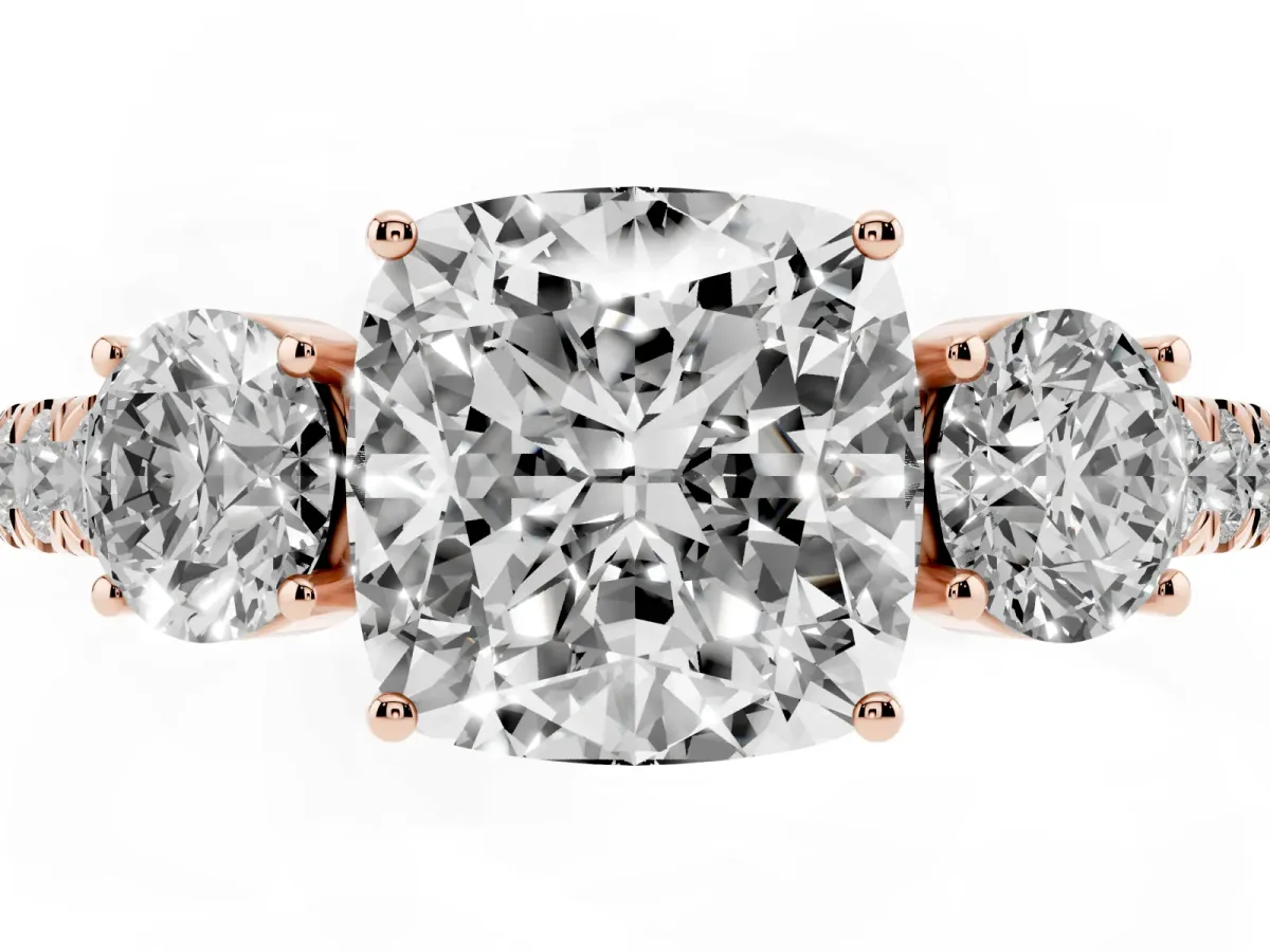 Cushion Cut Cut Diamond Three-Stone Ring with Round Side Stones and Pavé Band Rose gold