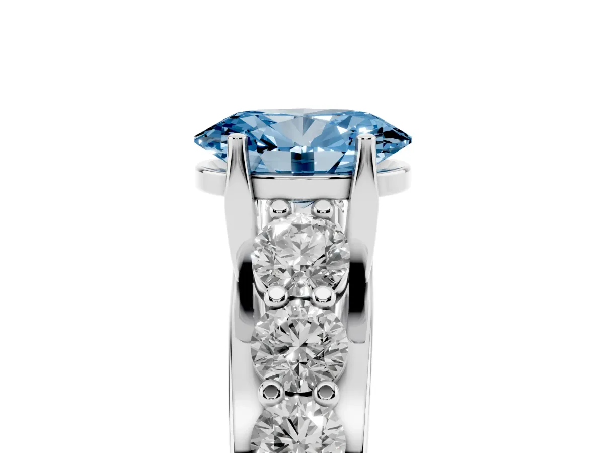 Fancy Blue Oval Cut Diamond Engagement Ring with Pavé Band and Four-Prong Setting Silver