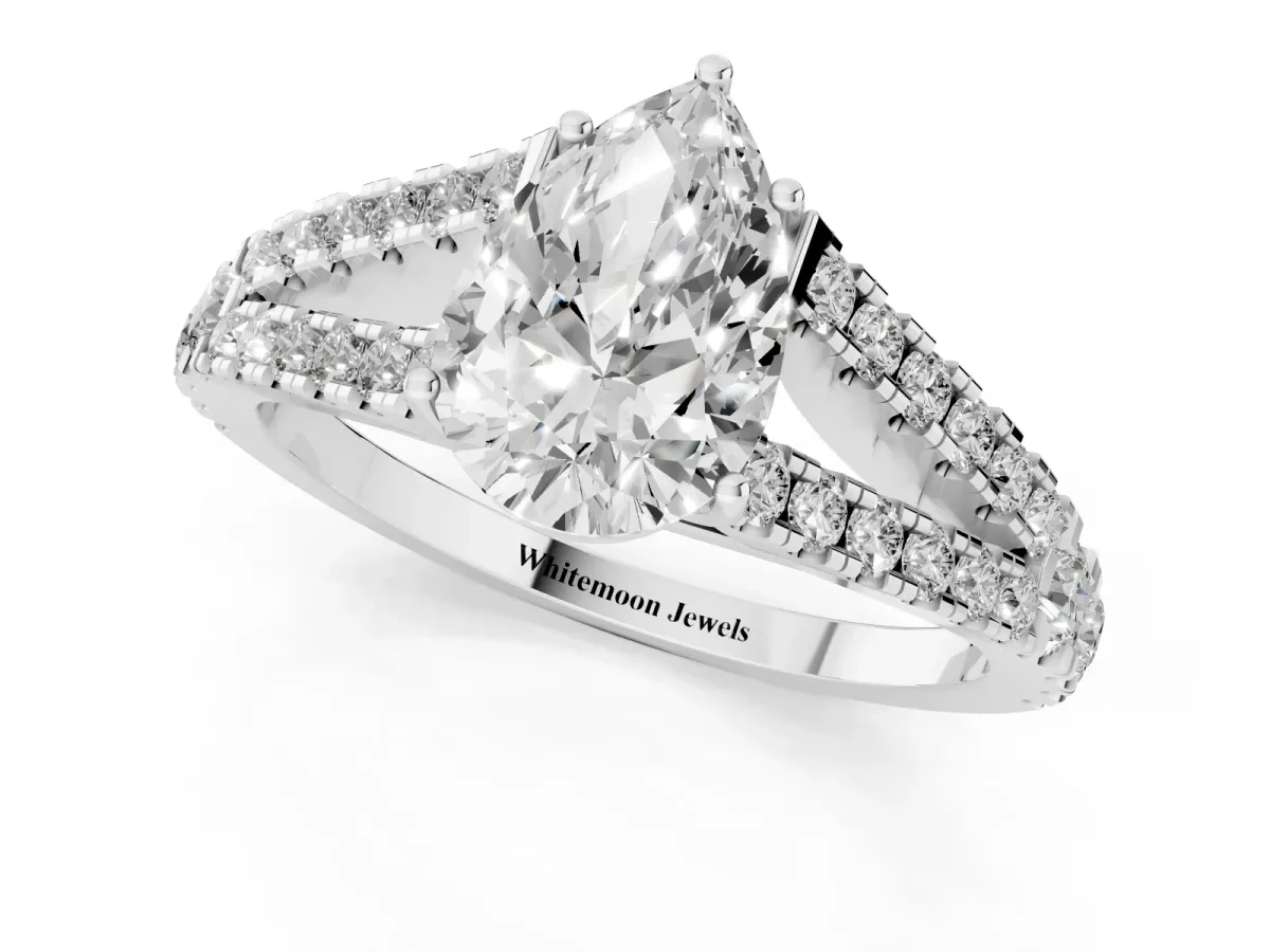 Pear Cut Diamond Split Shank Pavé Engagement Ring with Four-Prong Setting Platinum