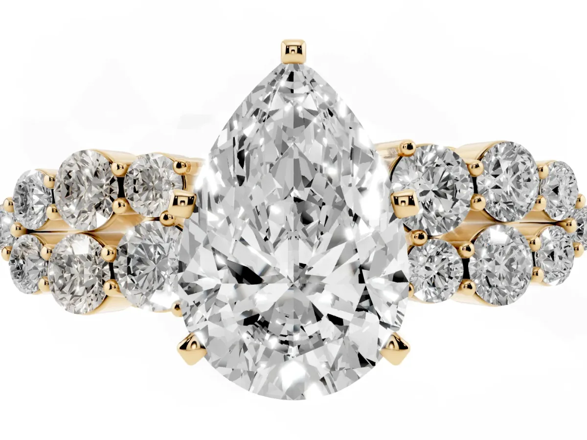Pear Cut Cluster Diamond Engagement Ring with Pavé Band and Four-Prong Setting Yellow gold