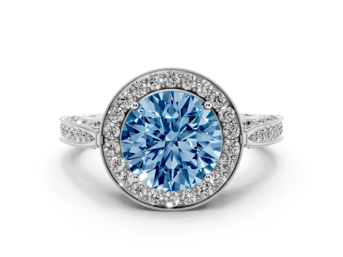 Fancy Blue Round Cut Halo Diamond Engagement Ring with Split Shank Band and Four-Prong Setting Silver