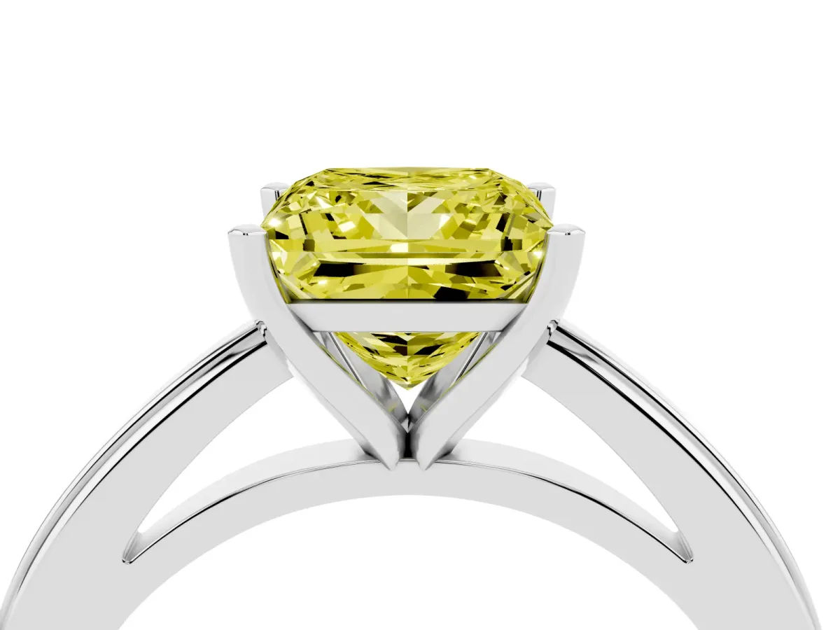 Fancy Yellow Princess Cut Solitaire Diamond Ring with Four-Prong Setting and Classic Band Silver