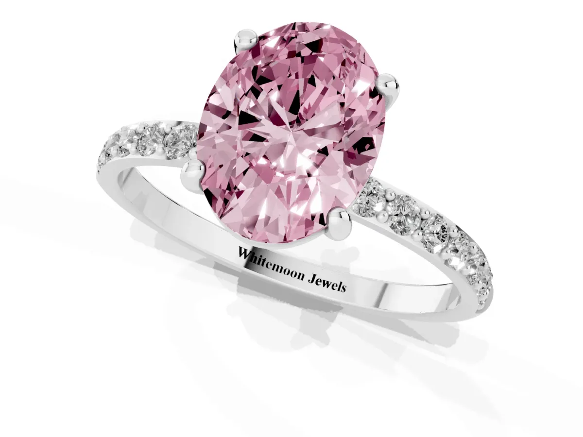 Fancy Pink Oval Cut Diamond Solitaire Ring with Round Pavé Band and Prong Setting Silver