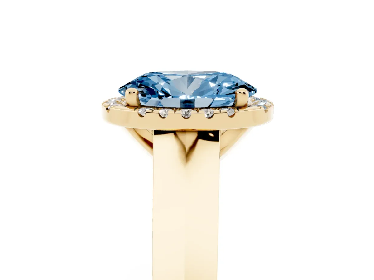 Fancy Blue Oval Cut Halo Diamond Ring with Cathedral Band and Four-Prong Setting Yellow gold