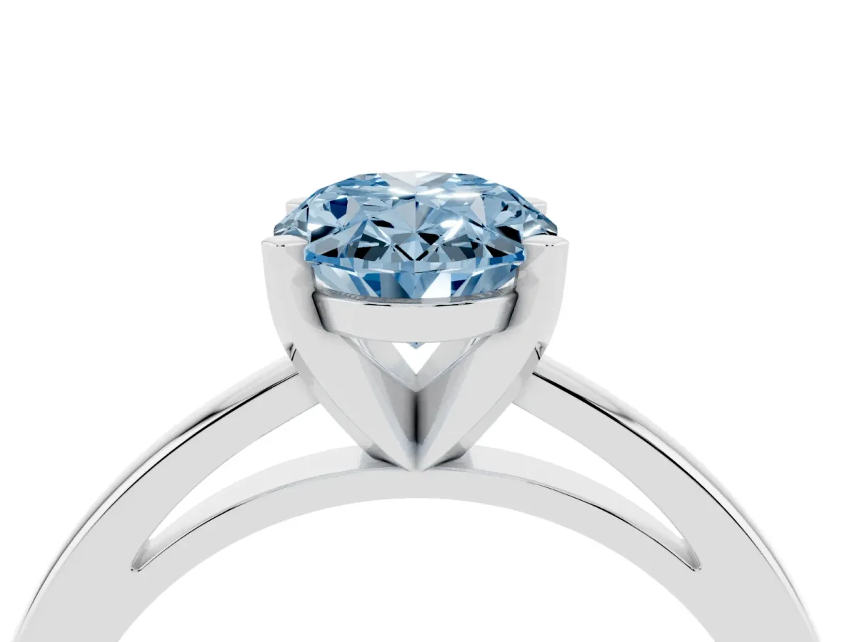 Fancy Blue Oval Cut Solitaire Diamond Engagement Ring with Four-Prong Setting on a Classic Band Silver