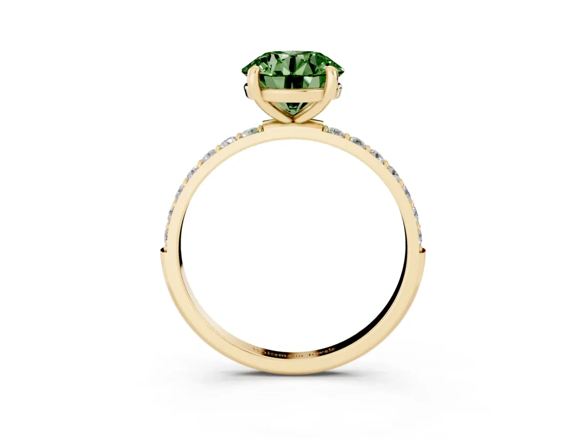 Fancy Green Round Cut Diamond Solitaire Ring with Round Pavé Band and Prong Setting Yellow gold