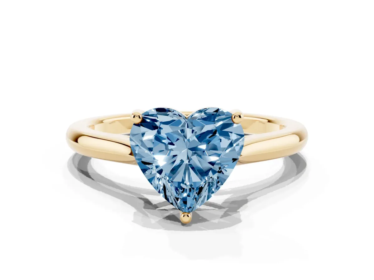 Fancy Blue Heart Cut Cut Solitaire Ring with Cathedral Band and Four-Prong Setting Yellow gold