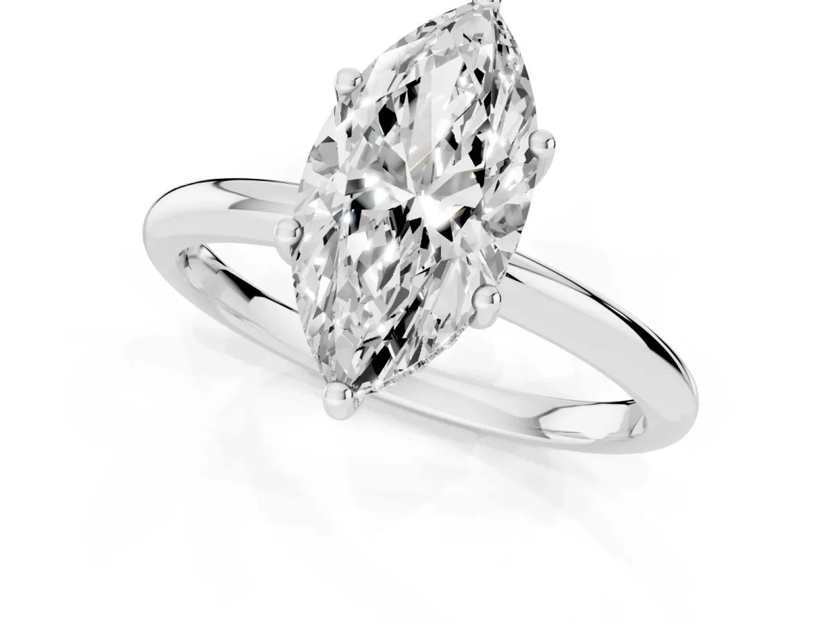 Marquise Cut Cut Solitaire Engagement Ring with Four-Prong Setting and Classic Band Silver