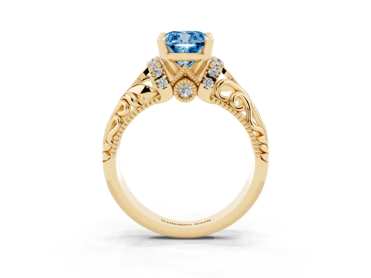 Fancy Blue Cushion Cut Solitaire Filigree Engagement Ring with Halo and Prong Setting Yellow gold