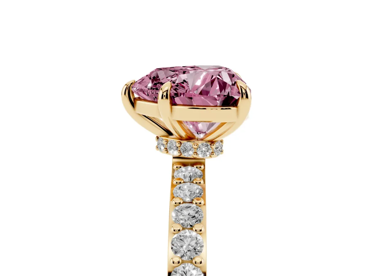 Fancy Pink Heart Cut Diamond Pavé Engagement Ring with Round Accents and Prong Setting Yellow gold
