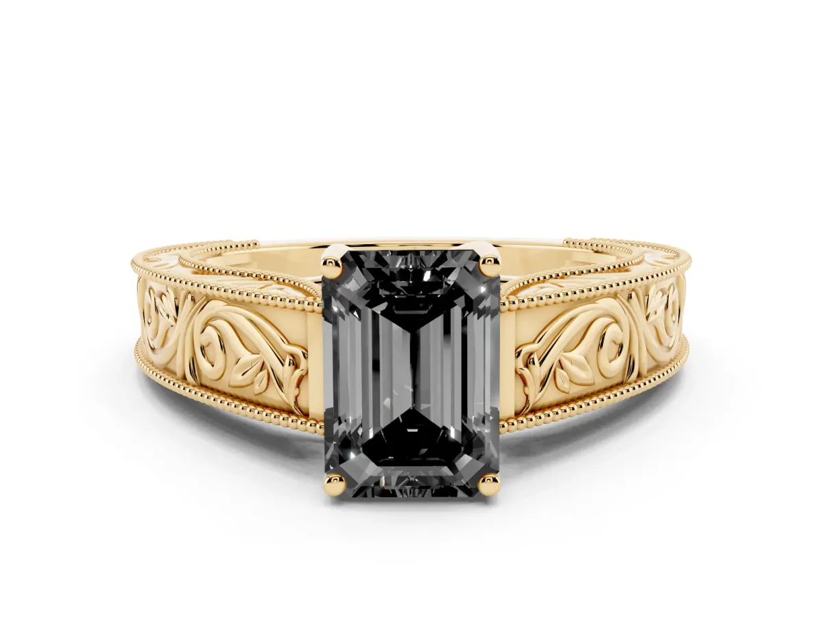 Fancy Black Emerald Cut Diamond Solitaire Ring with Engraved Band and Four-Prong Setting Yellow gold