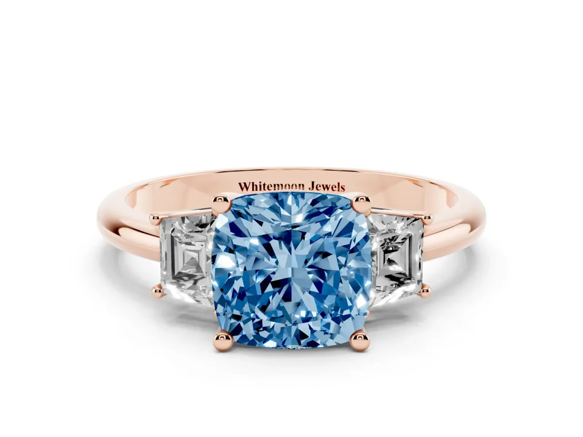Fancy Blue Cushion Cut Diamond Three-Stone Ring with Trapezoid Side Stones and Prong Setting Rose gold